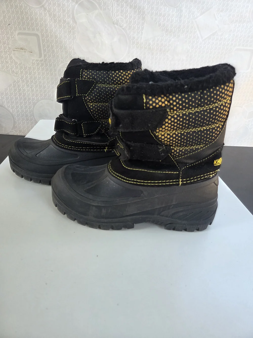 Khombu Kids Black Snow Boots with Yellow Stitching